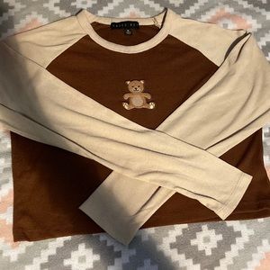 Used. Brown and light tan or cream color.